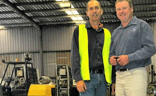 Glen McMurtrie and Allan Ruhle at the centre of APN Print’s new binding site. Glen McMurtrie and Allan Ruhle at the centre of APN Print’s new binding site.